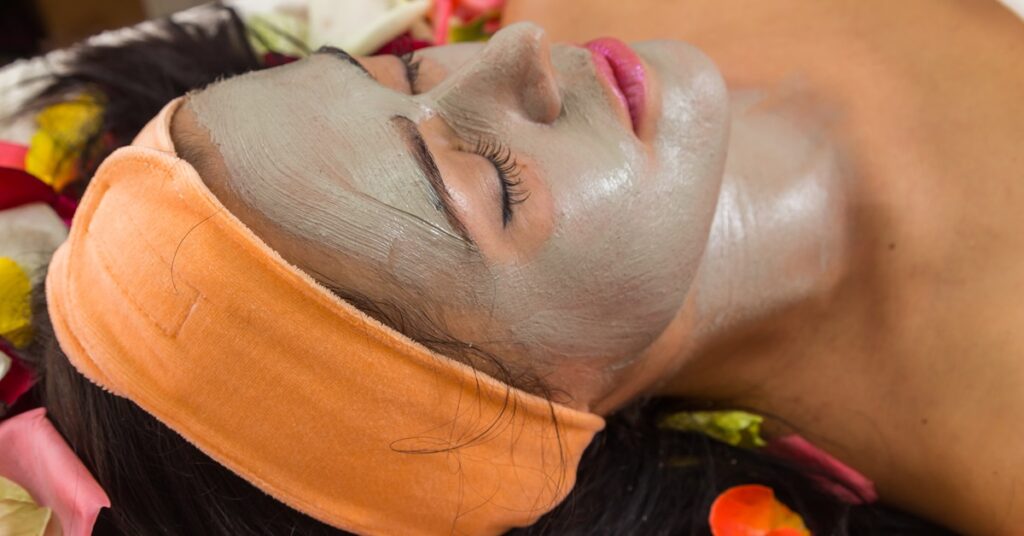 A woman is indulging in a relaxing facial mask at Brookhaven Med Spa.