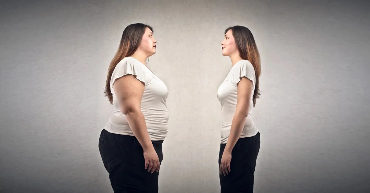 A woman is using semaglutide to control her weight loss, while standing in front of a mirror.